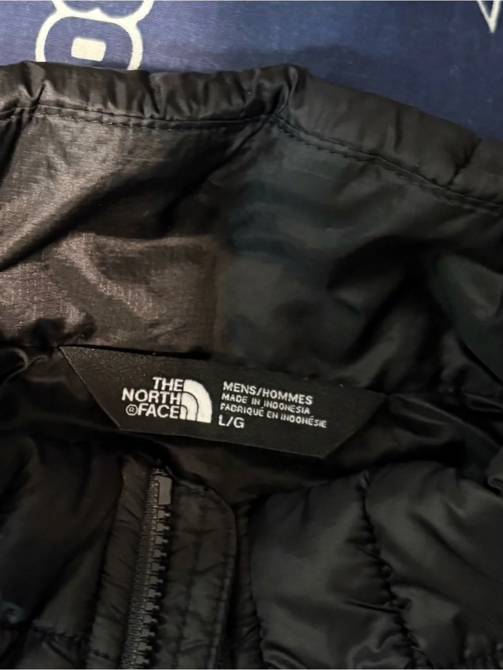 The North Face Black Quilted Puffer Vest with UT HSC Embroidery
